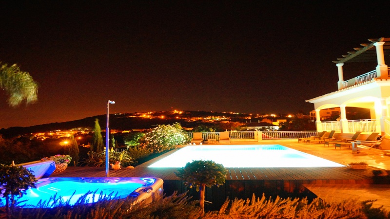 Pool, Jacuzzi and Terrace by night